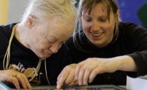 two people doing a jigsaw