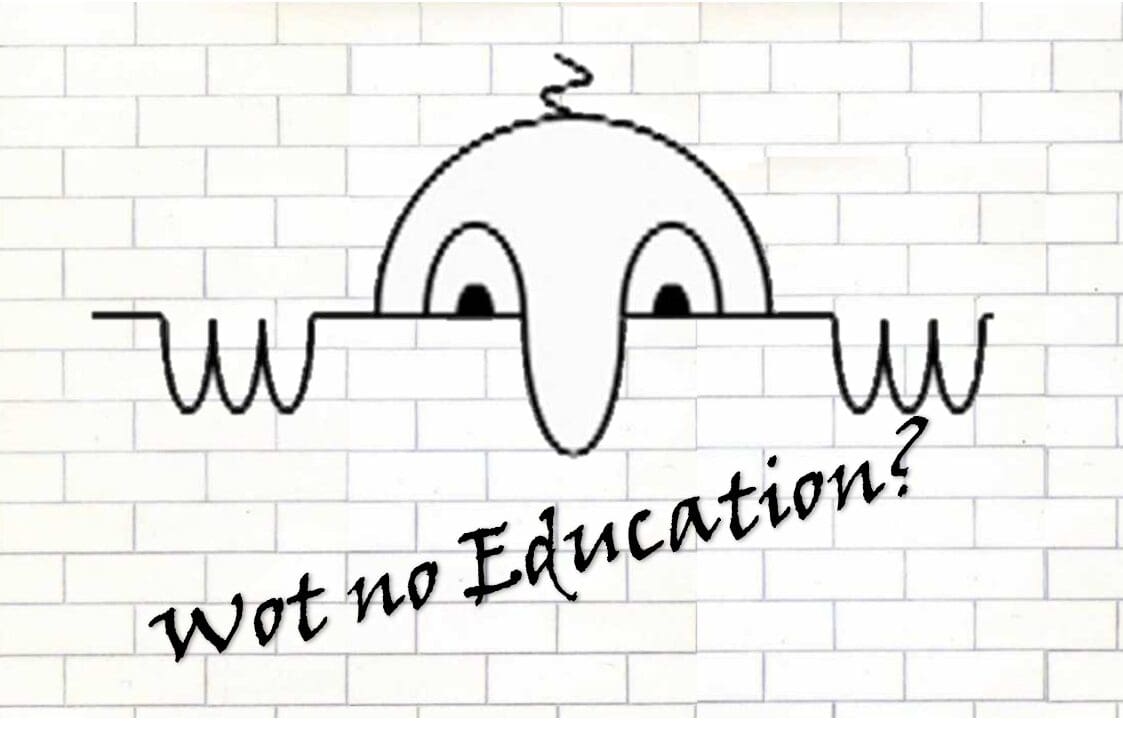 Cartoon man looking over wall (Killroy) with Wot no education written underneath